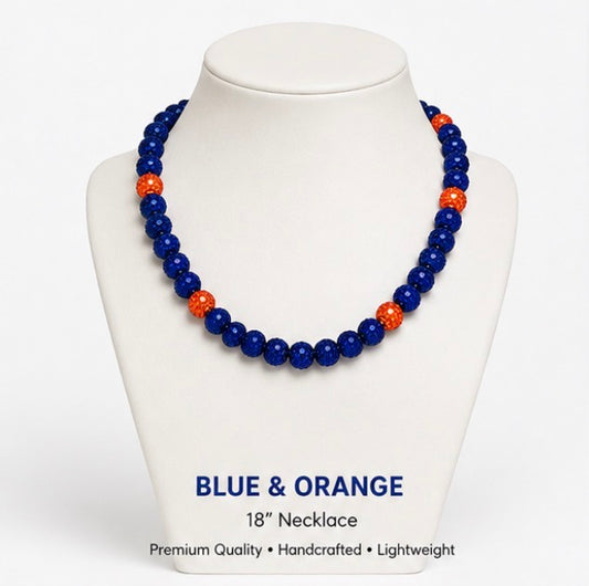 Blue and Orange rhinestone baseball necklace on display stand